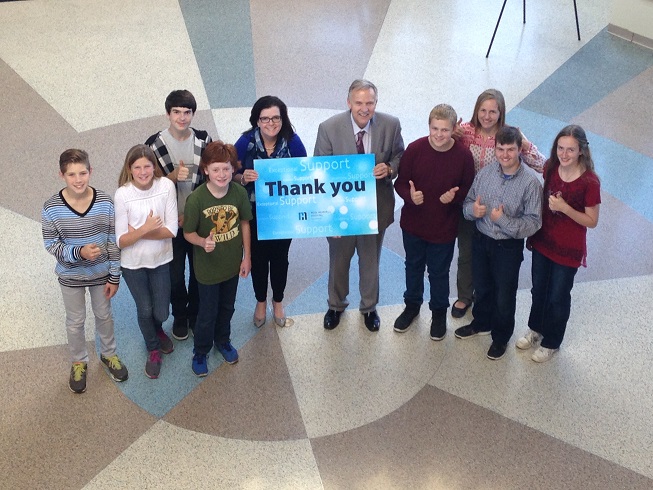 Grade 8 students from Heritage Christian School show their support